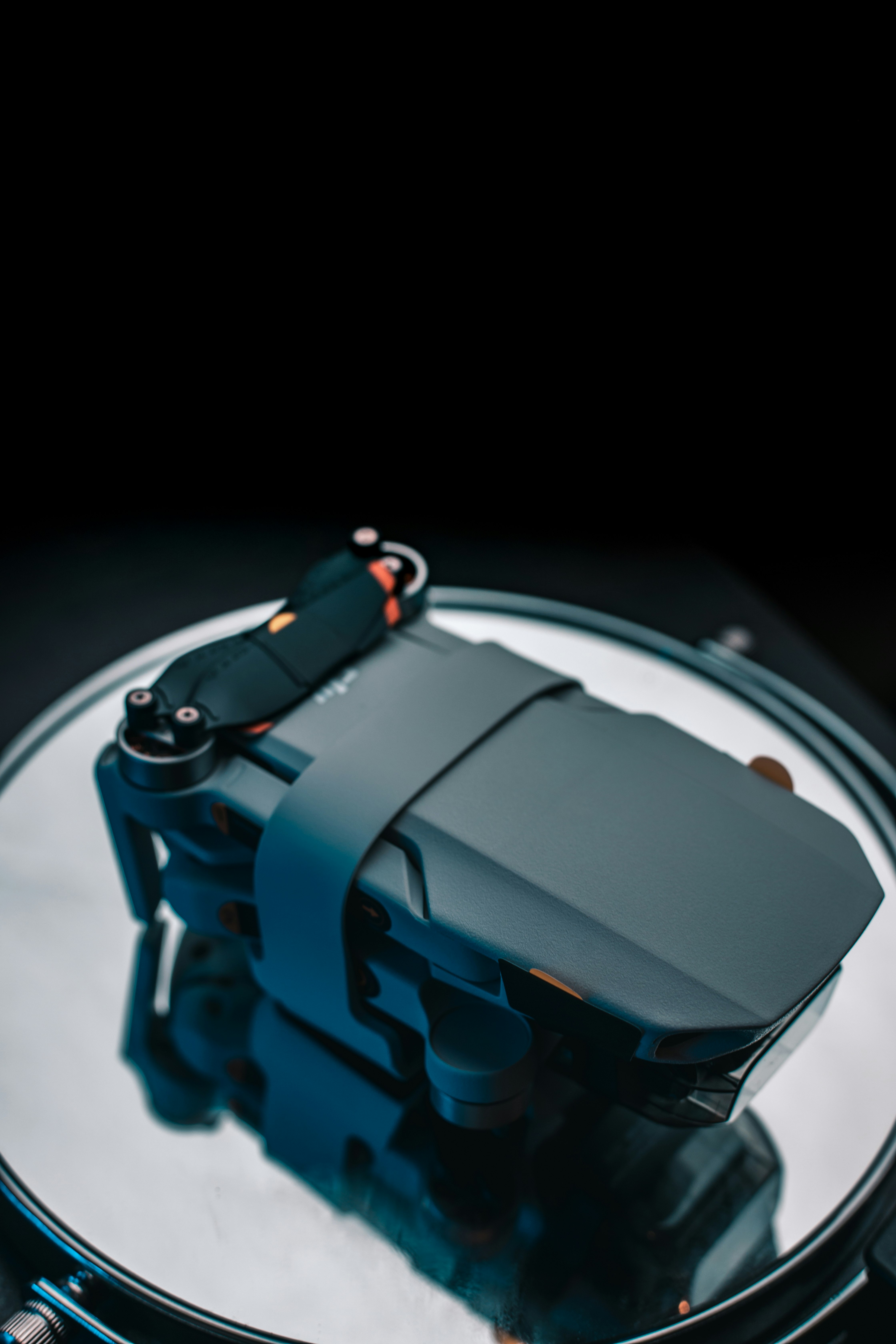 blue and black backpack on white table